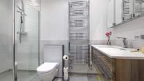 One of the en suite shower-rooms with large walk-in rainfall shower.