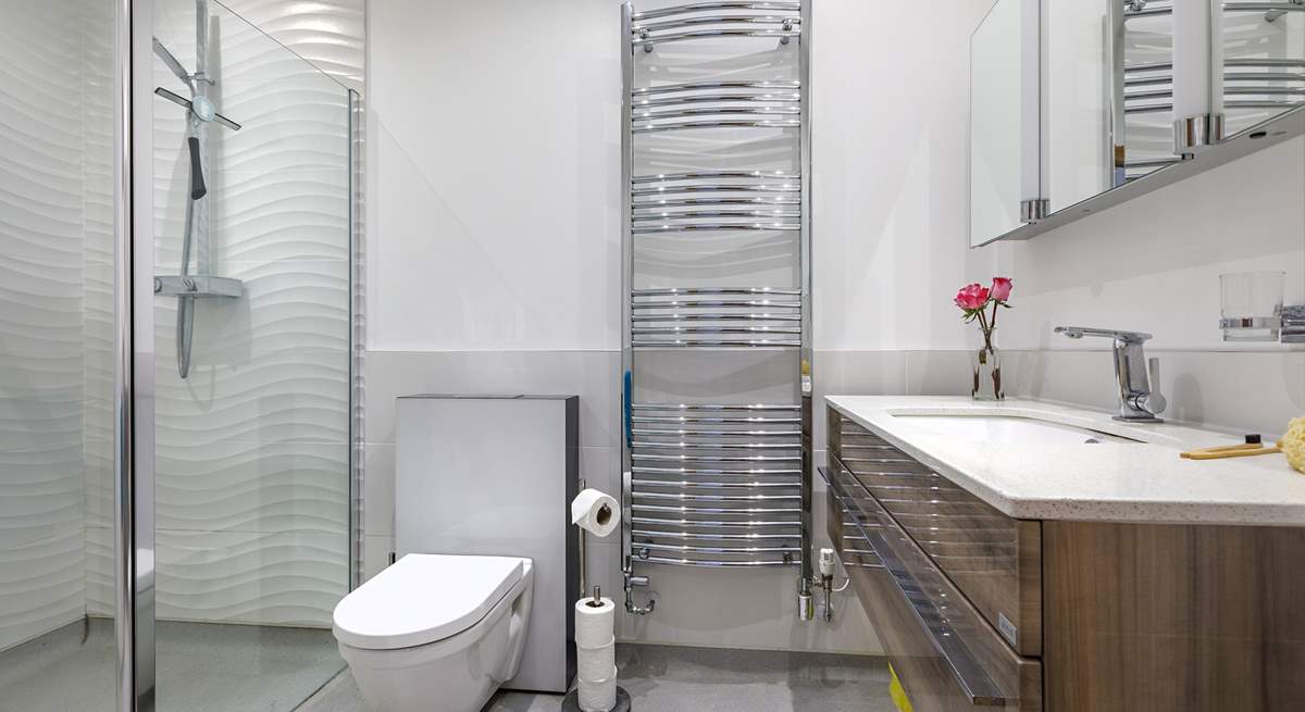 One of the en suite shower-rooms with large walk-in rainfall shower.