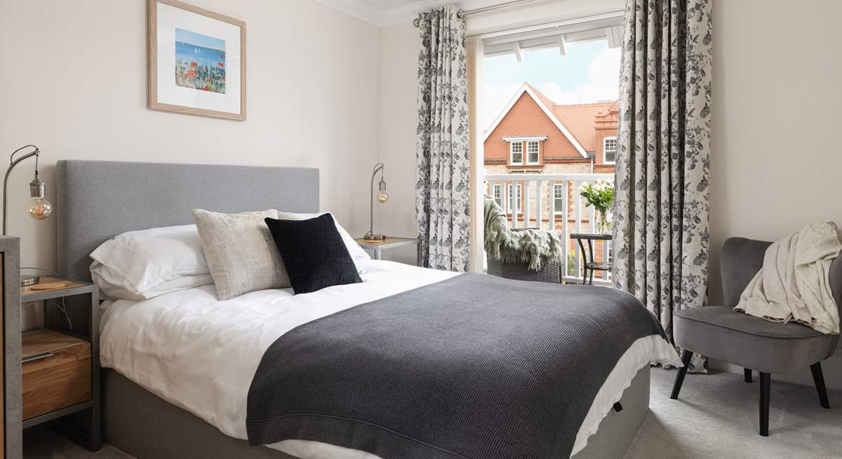 Bedroom 1 opens out on to the balcony - enjoy a morning coffee watching the sea.