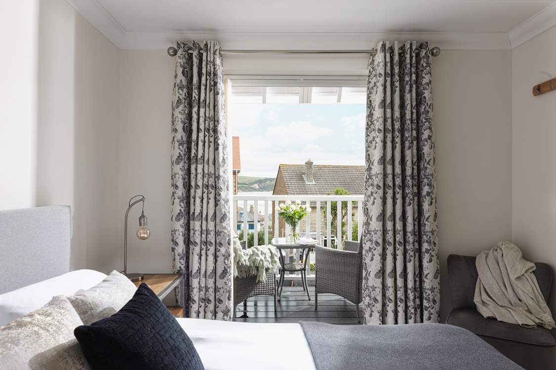 Look out to the sea and cliffs beyond.