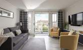 A beautifully stylish space with a balcony that has views across Swanage Bay. - Thumbnail Image