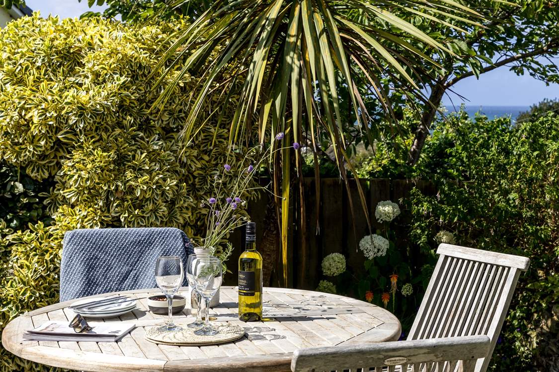 Sit back and relax with a glass of wine overlooking the deep blue sea.