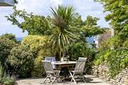 The terrace offers the perfect place to admire the beauty of Port Isaac in the distance.