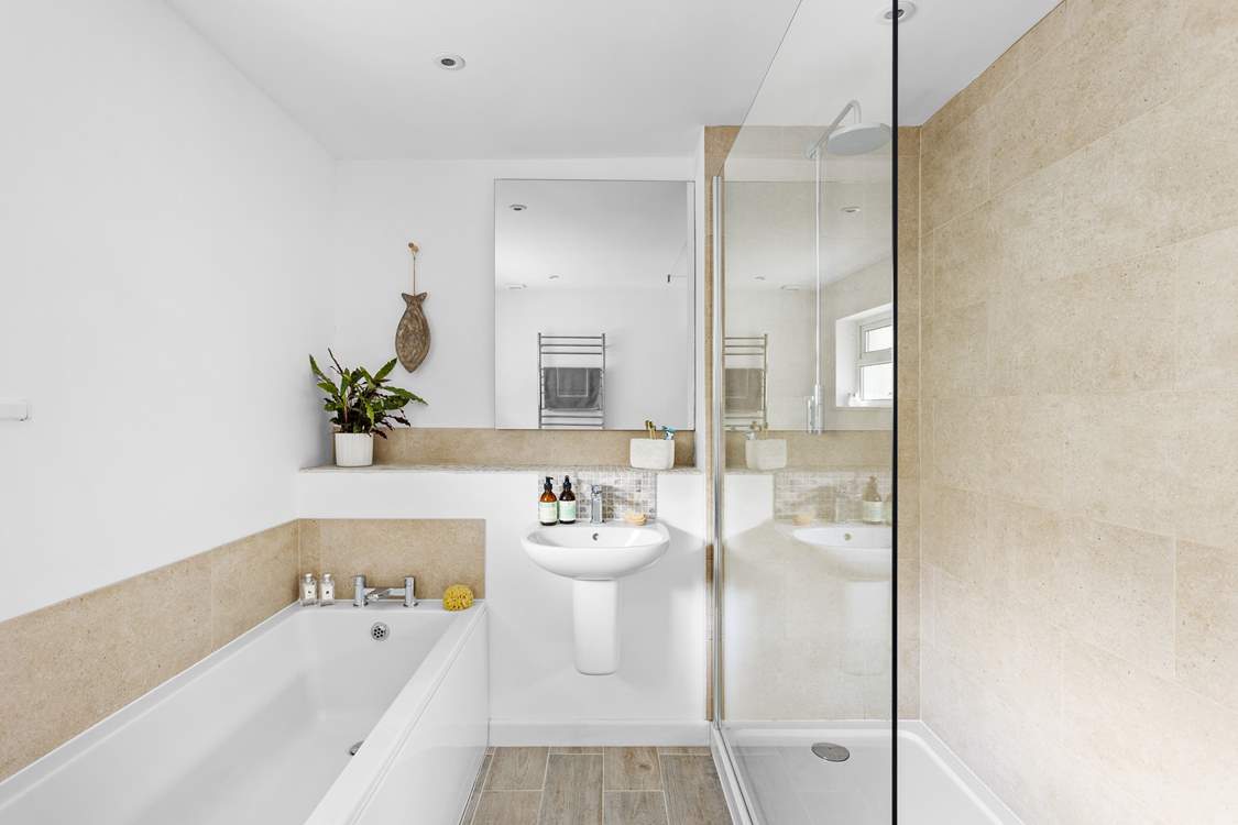 The family bathroom with both a bath and a separate power shower, keeping everyone happy.
