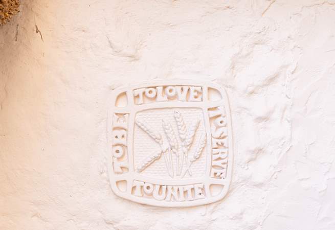 Unique ceramics can be found all over the outside of this lovely house. 