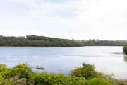 The first floor double bedroom has the most stunning outlook, watch the water come in and out with the tide.