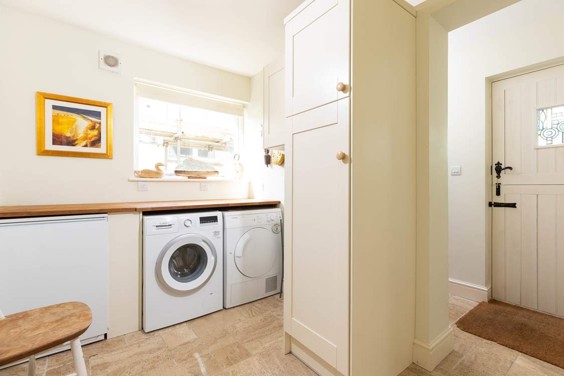 The handy-utility room on the ground floor is perfect for muddy welly boots and wet dogs to dry off.