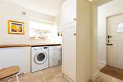The handy-utility room on the ground floor is perfect for muddy welly boots and wet dogs to dry off.