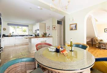 The open plan living space is so light and airy, there are two extra chairs for a party of six.  The ground floor bedroom leads off to the right along with the wet-room. 