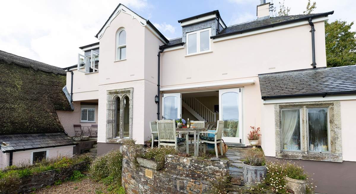 Condurro House is quite magnificent, semi-detached to a pretty thatched cottage. 