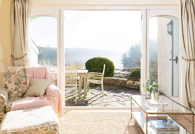 Open the double doors to the sunny terrace. 