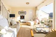 A light and airy sitting room overlooking the creek is such a tranquil spot.