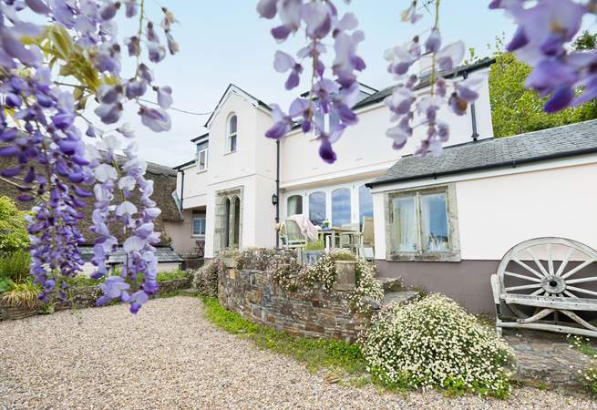 Condurro House is quite magnificent, semi-detached to a pretty thatched cottage. 