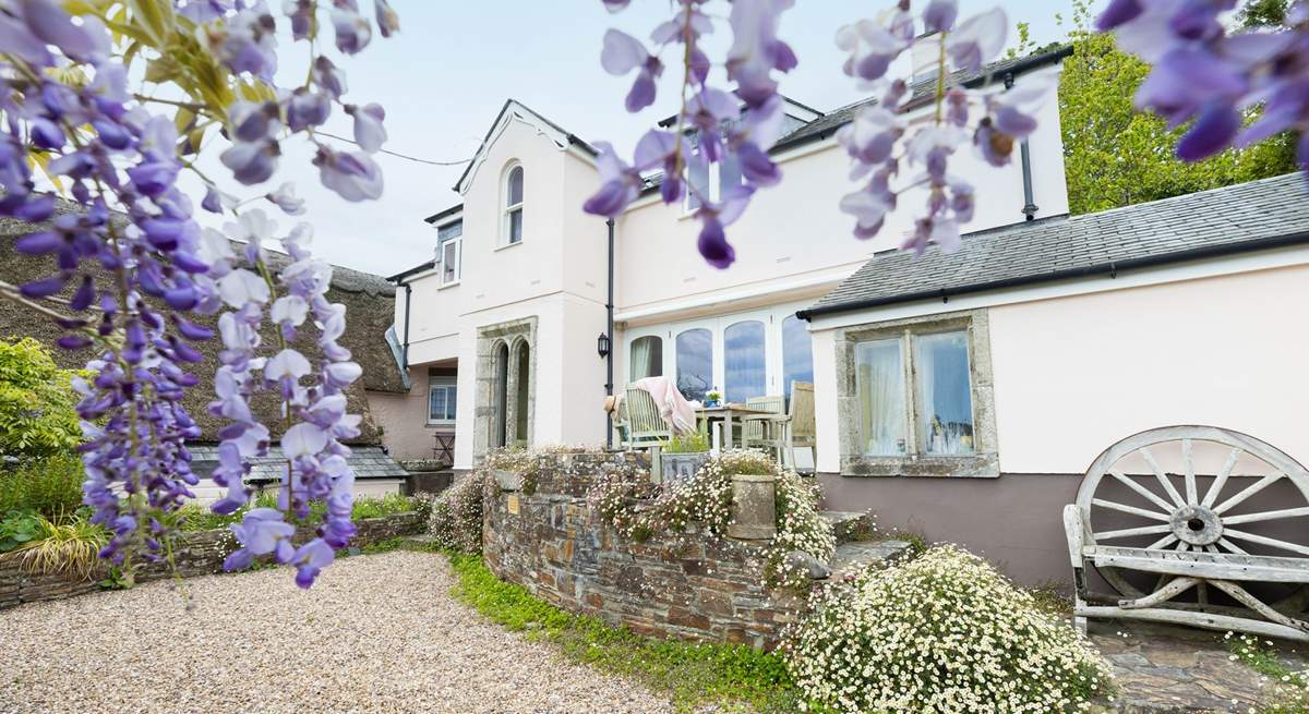 Condurro House is quite magnificent, semi-detached to a pretty thatched cottage. 