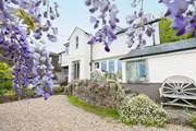 Condurro House is quite magnificent, semi-detached to a pretty thatched cottage.