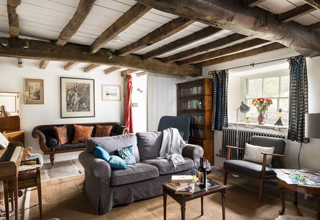 Gather round the piano for a sing song. 