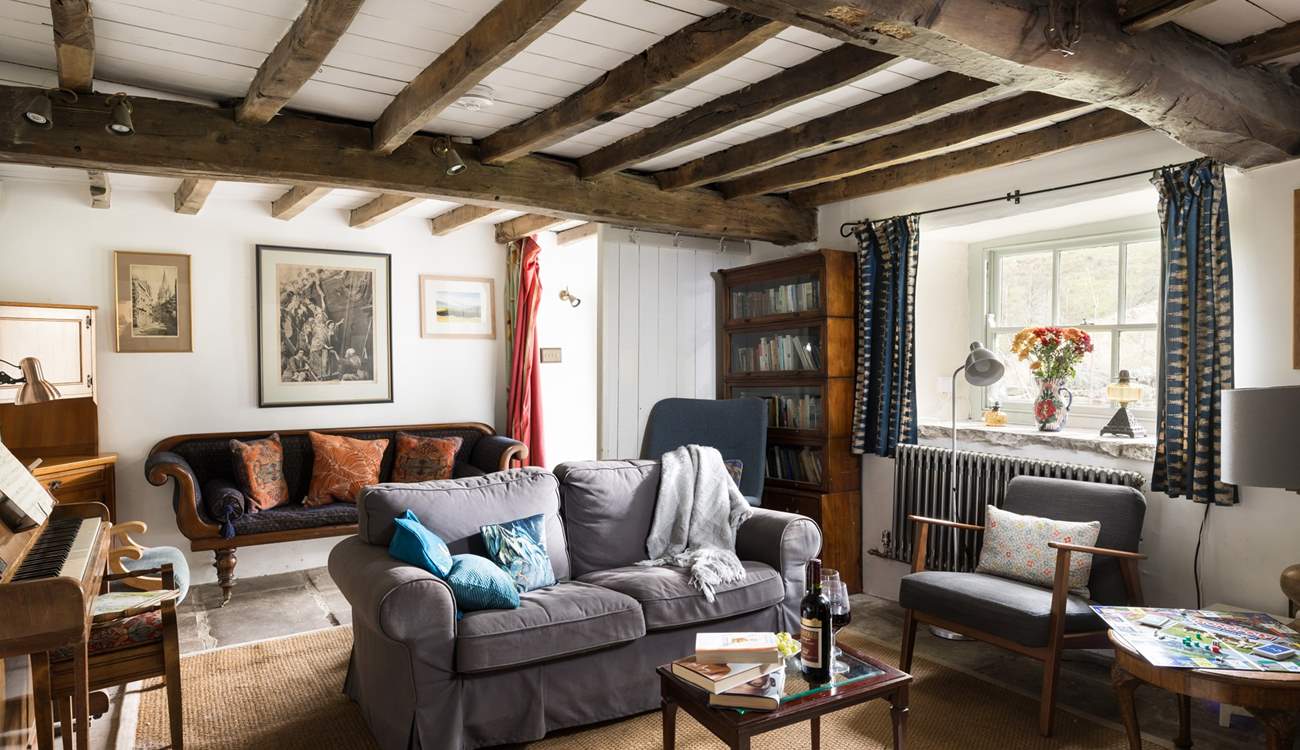 Gather round the piano for a sing song. 