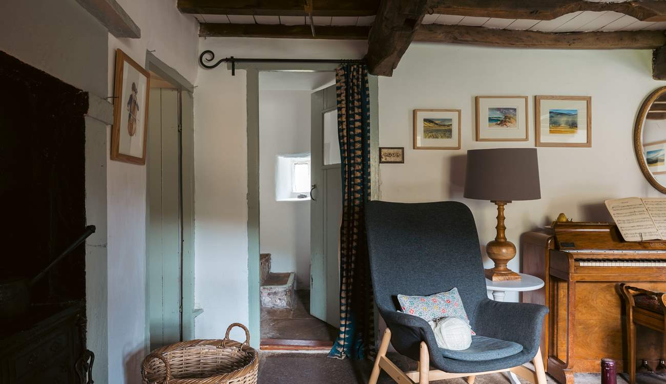 Peeking through from the sitting-room to the original stone staircase.