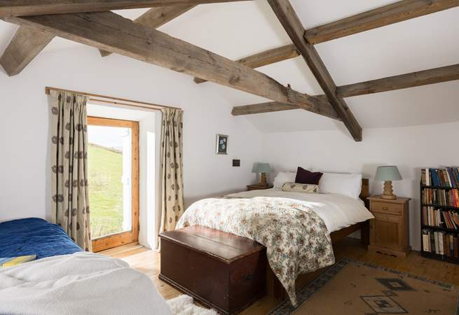 Beautiful old beams in this relaxing bedroom.