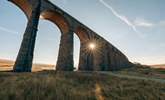 The sun shining through the Ribblehead Viaduct. - Thumbnail Image