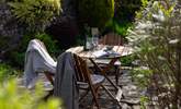 The glorious garden offers plenty of space to relax in. - Thumbnail Image