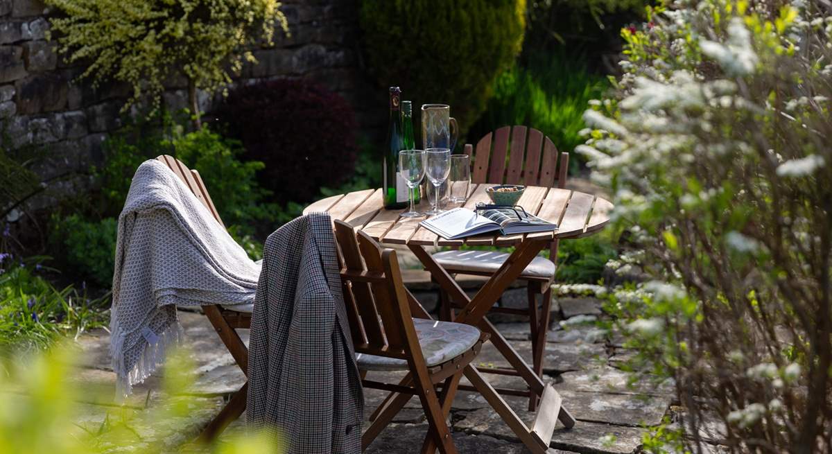 The glorious garden offers plenty of space to relax in.