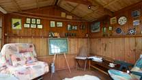Why not make use of this summer-house when the sun isn't shining.