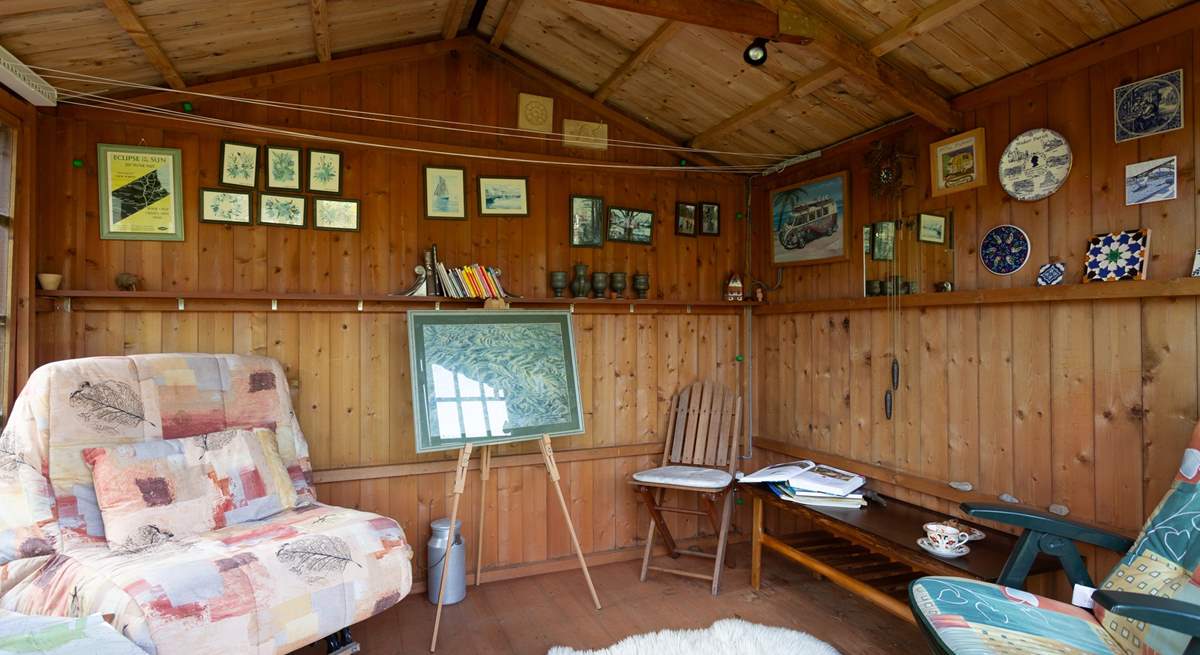 Why not make use of this summer-house when the sun isn't shining.