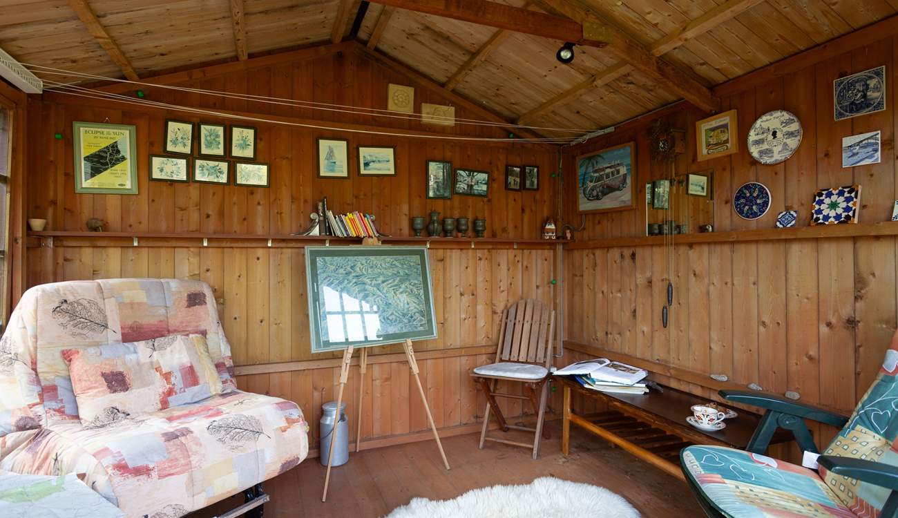 Why not make use of this summer-house when the sun isn't shining.