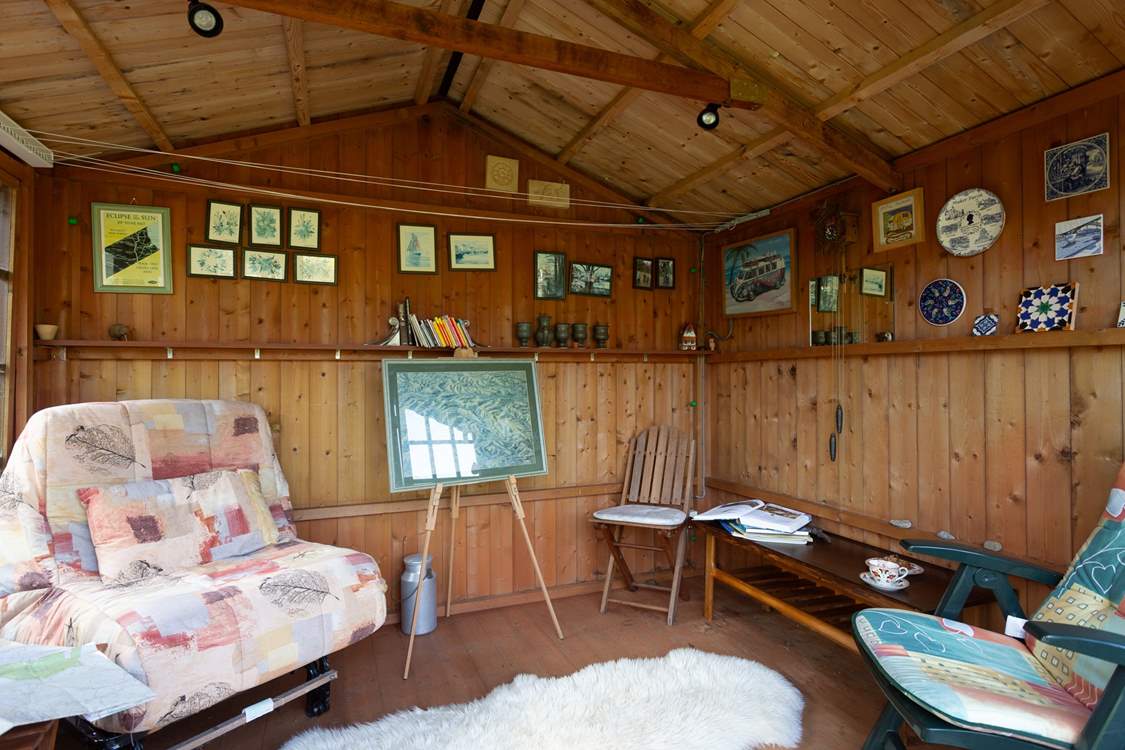 Why not make use of this summer-house when the sun isn't shining.