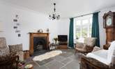 The sitting-room is full of olde worlde charm. - Thumbnail Image