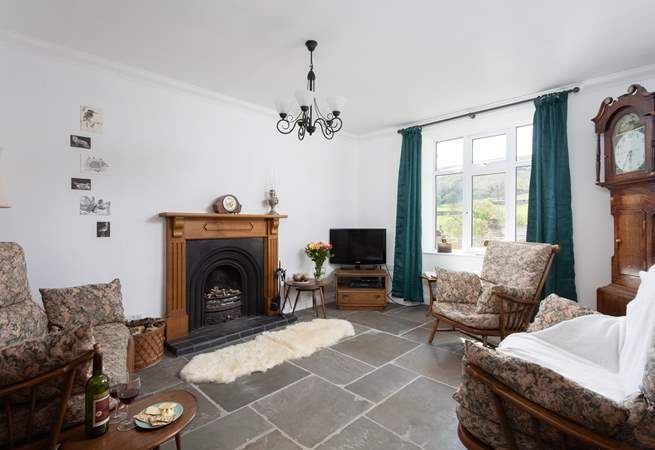 The sitting-room is full of olde worlde charm.