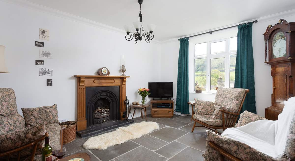 The sitting-room is full of olde worlde charm.