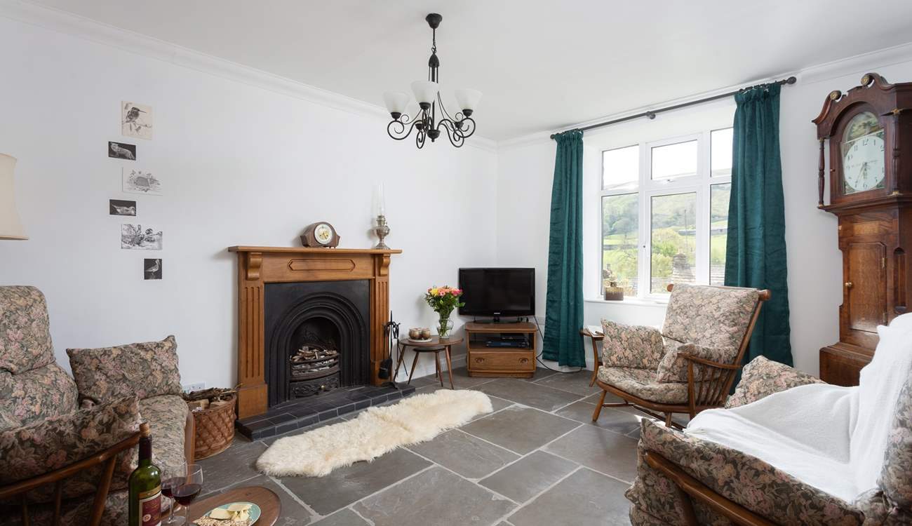 The sitting-room is full of olde worlde charm.