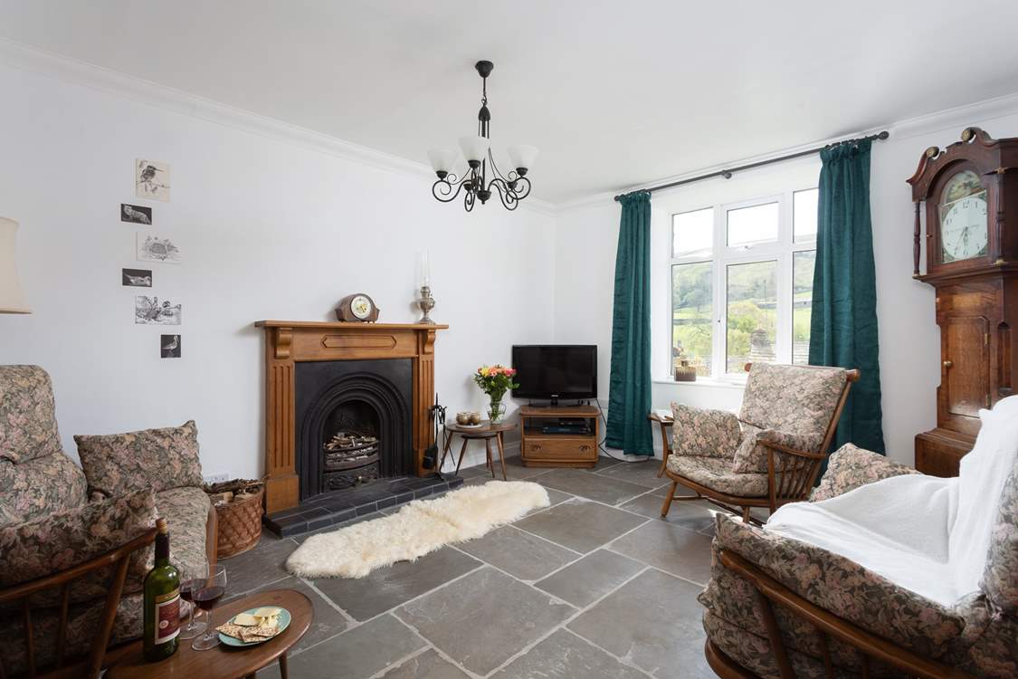 The sitting-room is full of olde worlde charm.