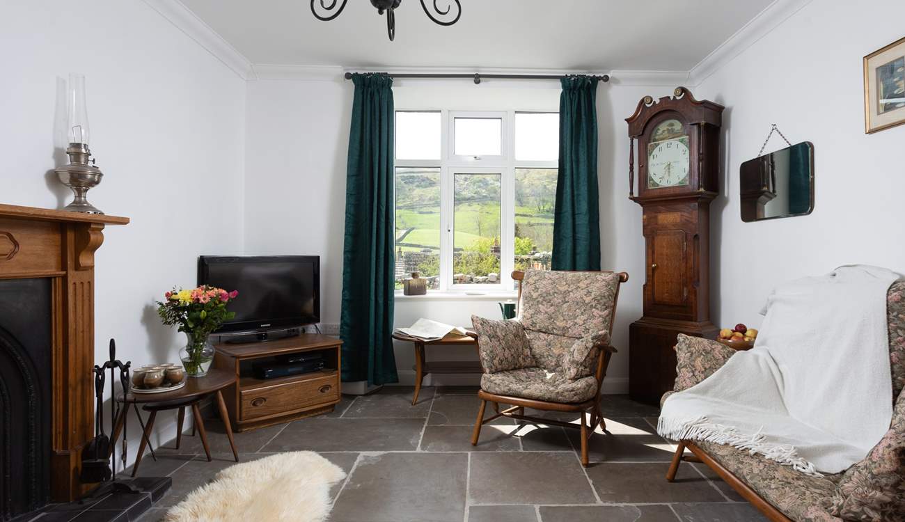 Check out the time on the grandfather clock.