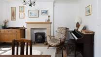 Relax looking out over the hills or maybe have a go at tinkling the ivories on the piano.