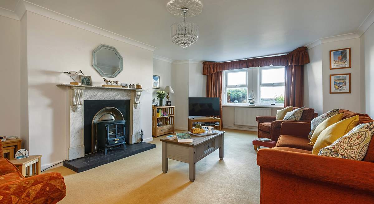 Victorian elegance and high ceilings make this a perfect place to kick off your shoes and relax. 