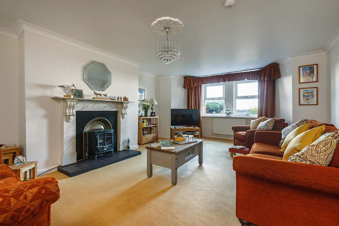 Victorian elegance and high ceilings make this a perfect place to kick off your shoes and relax.