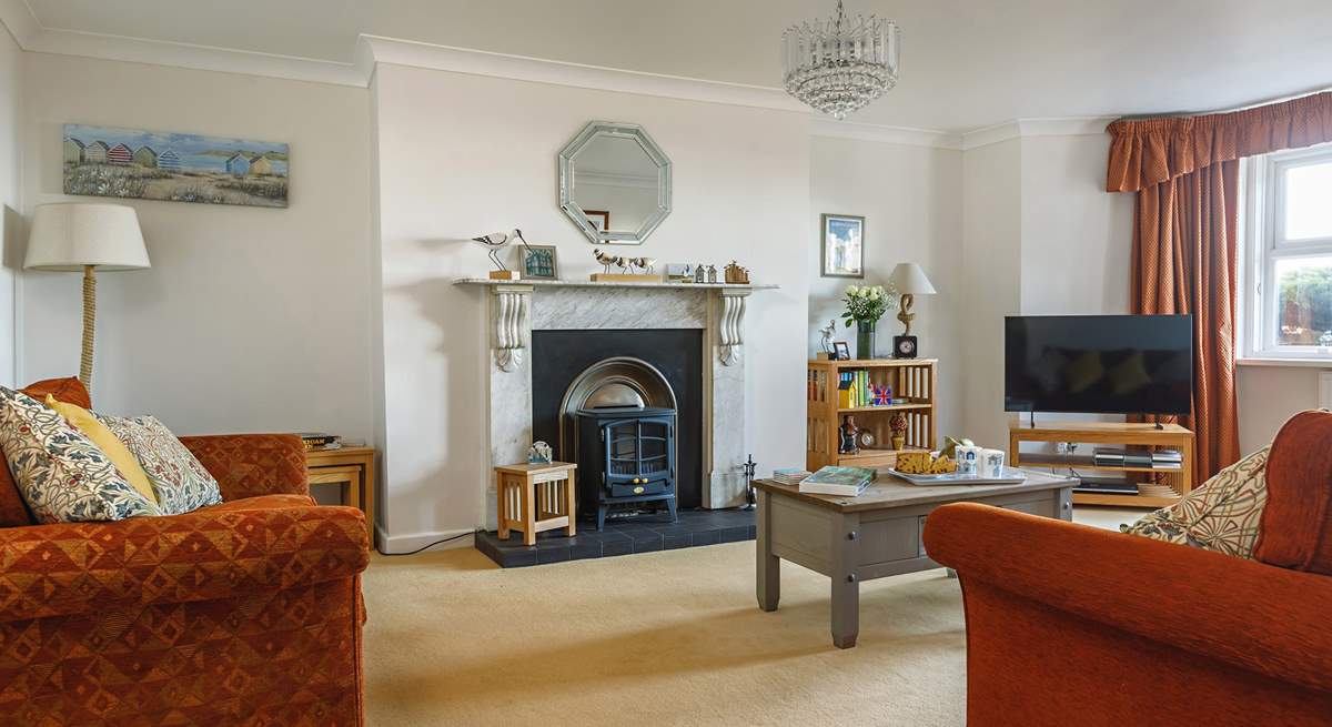 Relax in the elegant sitting-room.