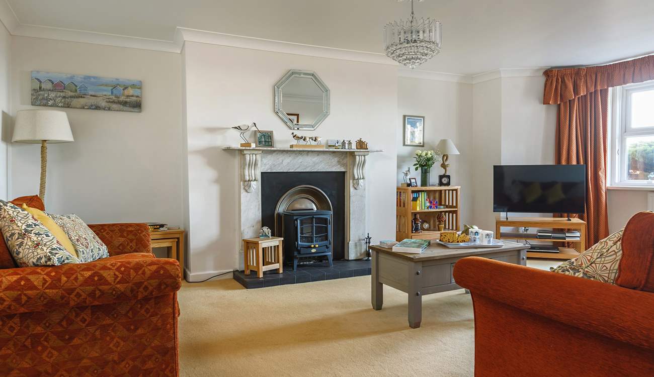 Relax in the elegant sitting-room.