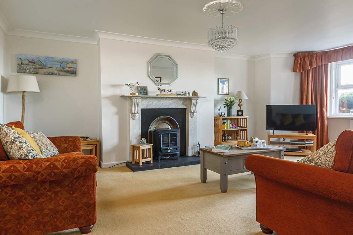 Relax in the elegant sitting-room.