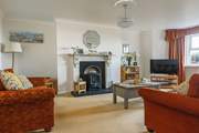 Relax in the elegant sitting-room.
