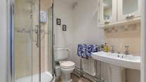 A roomy en suite for the principal bedroom awaits.