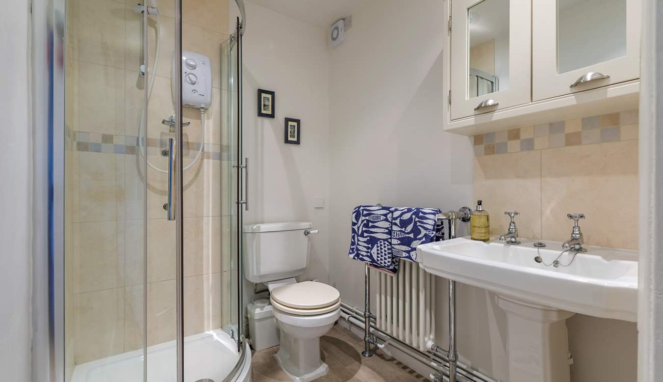 A roomy en suite for the principal bedroom awaits.