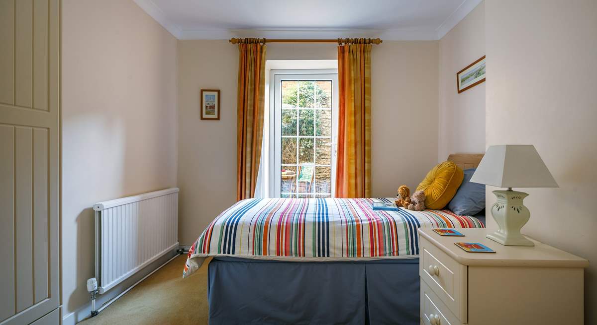 The light floods into the twin bedroom and opens onto the terrace, great for couples.