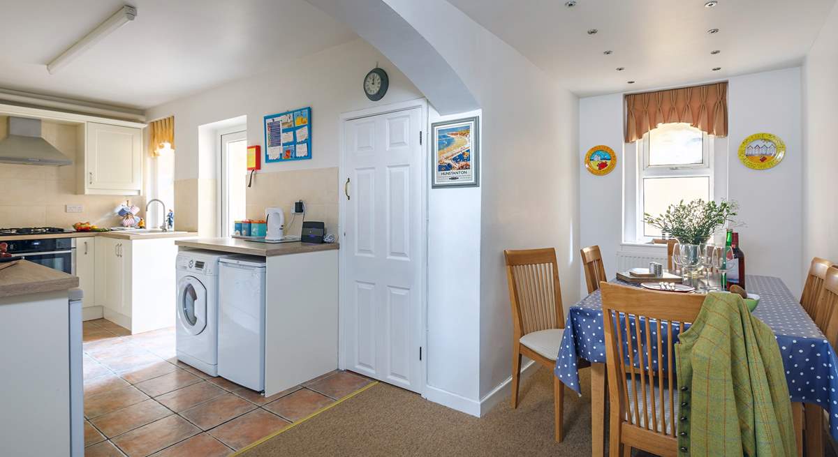 The light floods into the well-equipped kitchen.