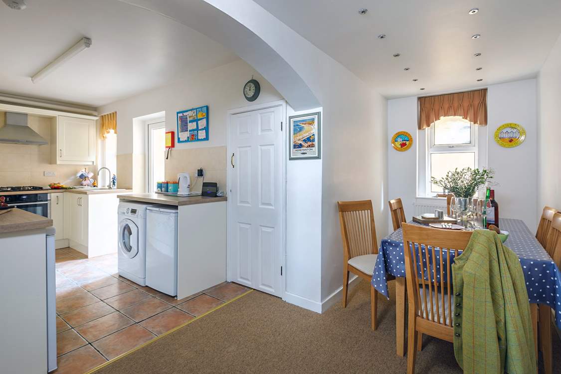 The light floods into the well-equipped kitchen.