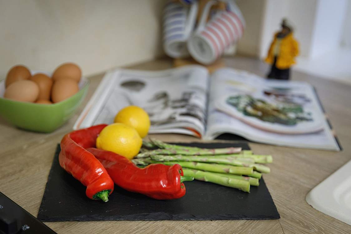 Create a feast for friends in the light filled kitchen.