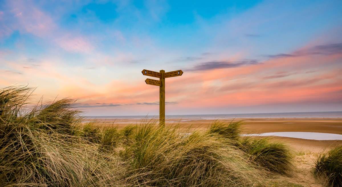 Explore the coastal paths with an abundance of birdlife and magnificent sunsets.